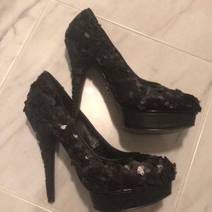 Black platform pumps